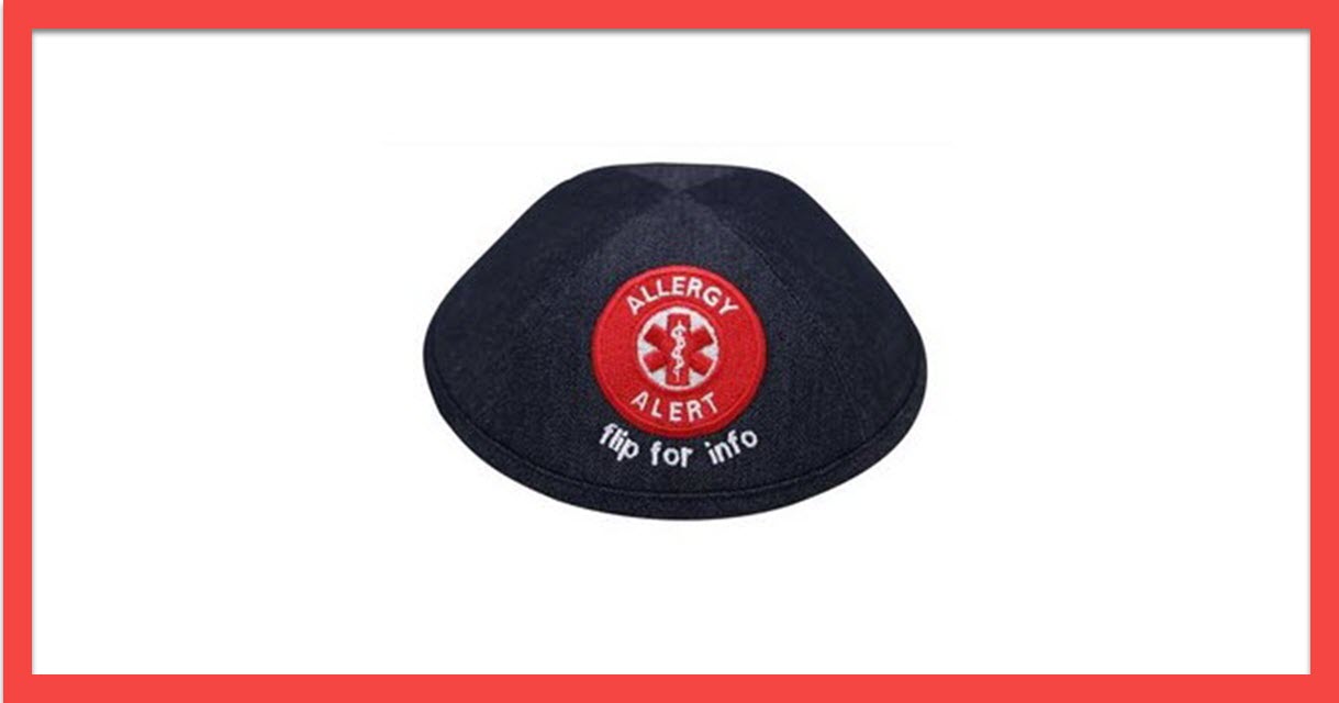 Black iKIPPAH brand yarmulke with bright red allergy alert patch to tell everyone about your kids allergies.
