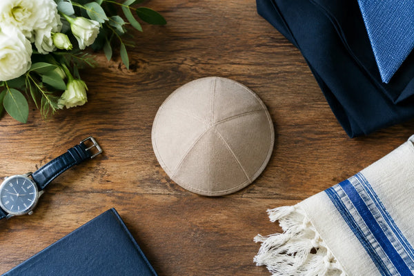 Why do so many grooms pick a beige yarmulke for outdoor ceremonies