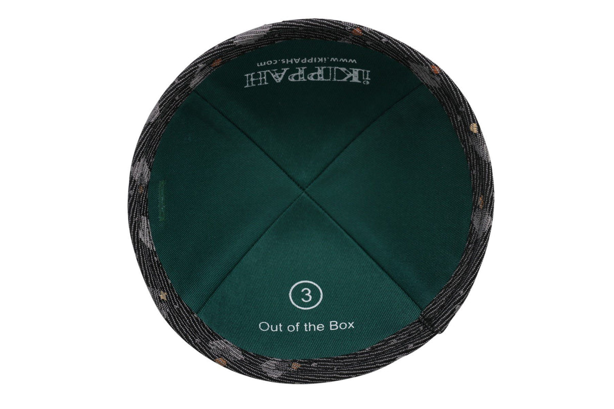 A black & grey iKIPPAH brand yarmulke with a box theme inside view.