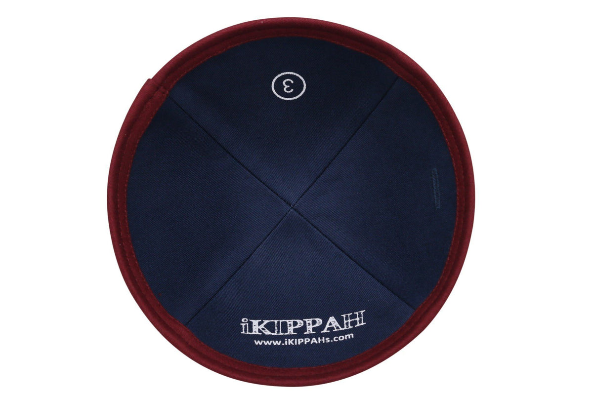 A burgundy iKIPPAH brand yarmulke inside view.