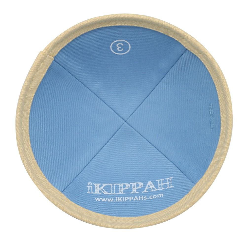 A bright light yellow linen iKIPPAH brand yarmulke inside view with label.